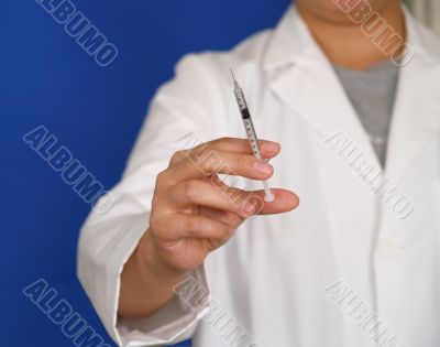 Doctor with injection