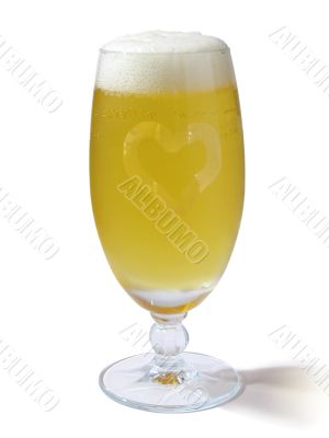 Wet glass of beer with heart isolated on white
