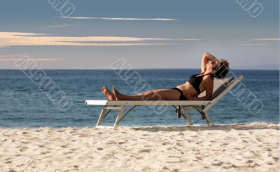 Woman relaxing on a beach