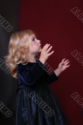 happy little girl in party dress