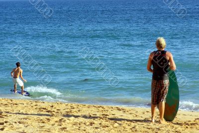 A young boy on surf