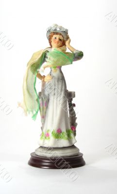 Figurine of a lady with green scarf