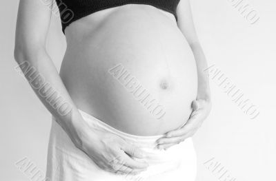 38 Weeks pregnant woman holding belly