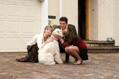 Happy family with a dog