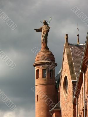 Statue on the roof of a cathedral