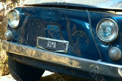 retro car in the old street of Rome