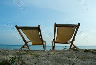 beach chairs at tropical resort