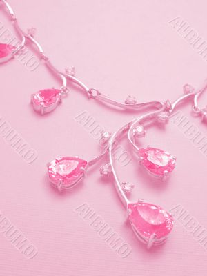 Rosy background with necklace