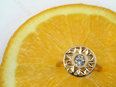 Orange and diamond ring