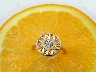 Orange and diamond ring