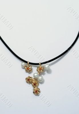 Golden necklace with pearls