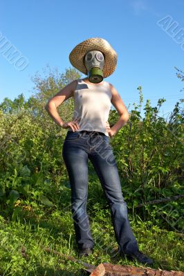 woman in gas-mask at garden work