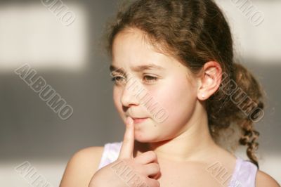 Cute girl thinking