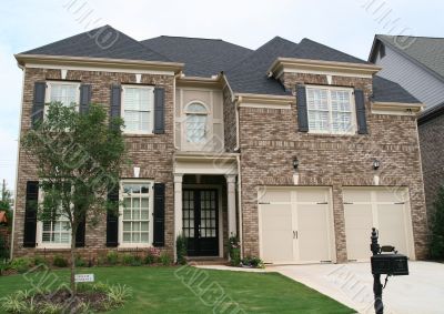 Brown and Tan Brick House