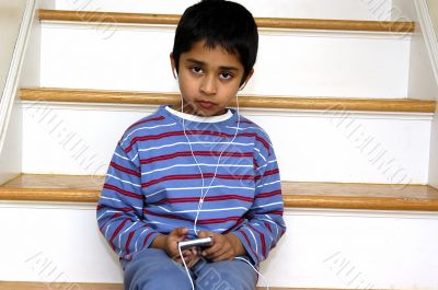 Kid listening to music
