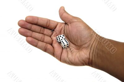Pair of dice in a hand