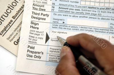 Signing a tax return Signing a tax return