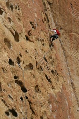 Rock climber on potholes route