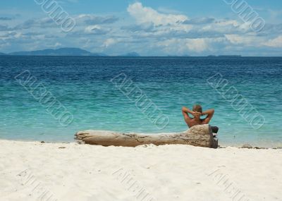 young man in the beach