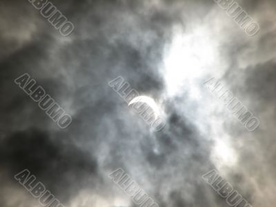 Partial solar eclipse in the clouds