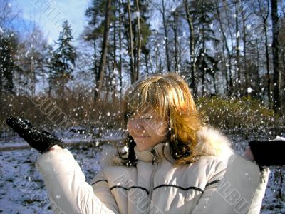 Winter season. Girl and snow