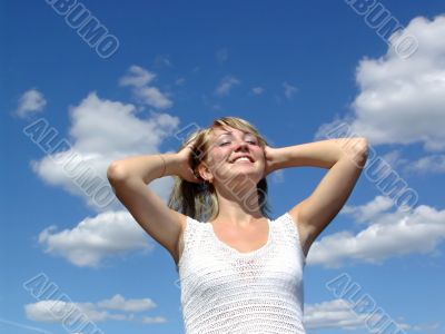 Happy girl in clouds