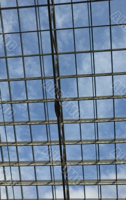 blue skies through windows of business center