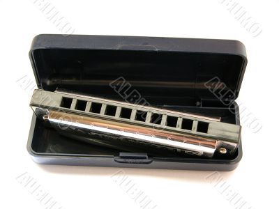 Chromatic Harmonica well used in the plastic box
