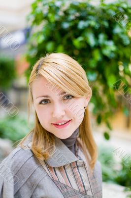 Pretty girl in shop look at camera #1