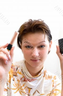 Woman preparing to make-up