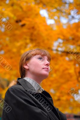 Woman look forward in autumn park #2