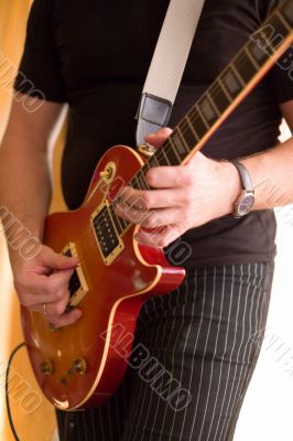 Musician play on guitar #1 Musician play on guitar #1