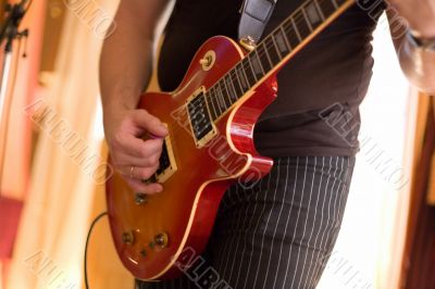 Musician play on guitar #2 Musician play on guitar #2