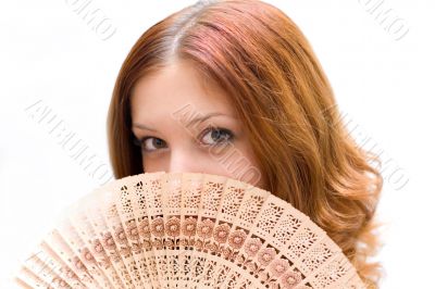 Girl close your face by fan