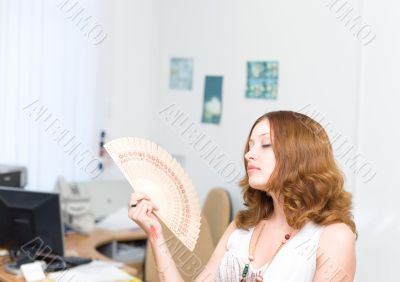 Girl brush away face by fan #1 Girl brush away face by fan #1