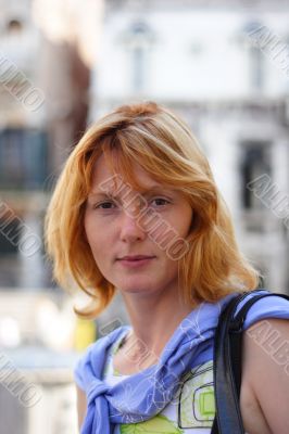 Pretty girl on street look at camera