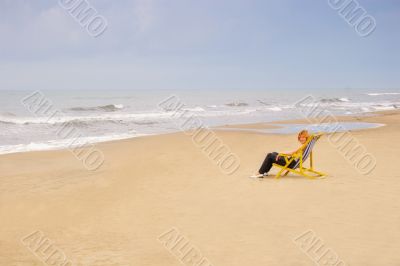 woman in chair on sea beach woman in chair on sea beach