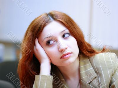 Girl with reddish hair in office #2