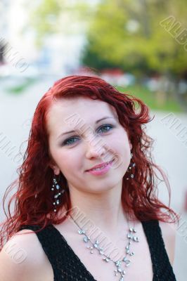 Pretty girl on street look at camera