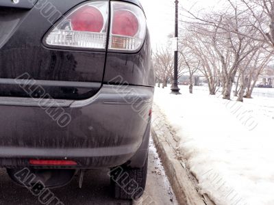 dirty vehicle rear end - covered in road salt