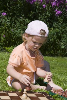 Girl playing chess