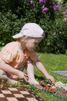 Girl playing chess