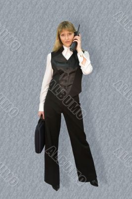 Business woman on grey