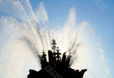 Fountain on blue sky