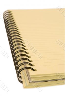 yellow copybook over white