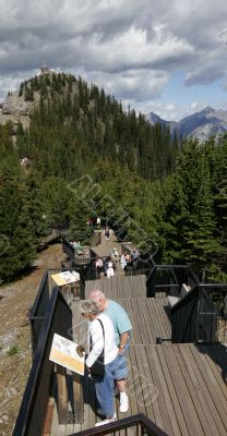 Retired Couple Reads Trail Information - Banff