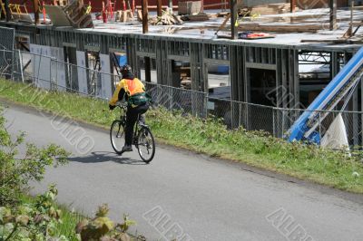 Bicyclist on 	Burke 	Gilman bike trail