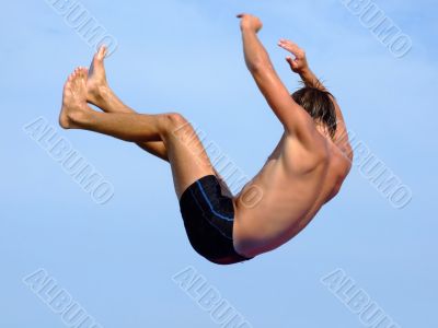 The falling guy on a background of the blue sky The falling guy on a background of the blue sky