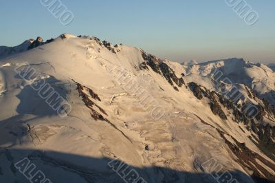 Mountain summit in evening sunlight