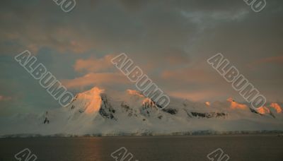 Sunset highlights on steep mountain ridges